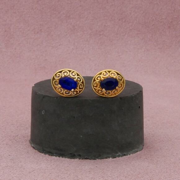 Sterling Jewelry - sterling silver gold plate deep blue topaz scroll stud earrings
